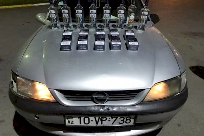   Ölkəyə spirtli içki və siqaretlər keçirmək istədi   