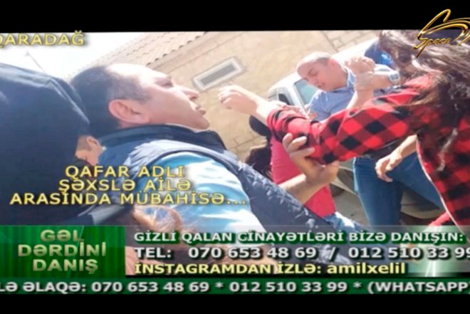    Polisin önündə qadına belə yumruq atdılar - Video   