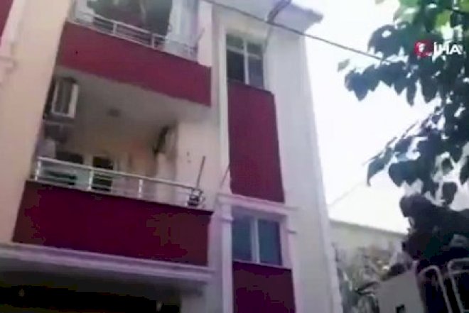    Əsəb keçirən qadın əvvəl evini yandırdı, sonra balkonda rəqs etdi - Video   