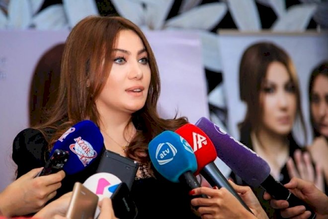    Ruhi yenə övladlarının üzünü gizlətdi - Foto   