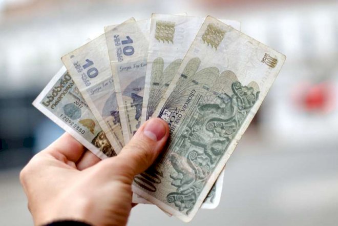    Gürcüstanda dollar 2,95 larini ötdü   