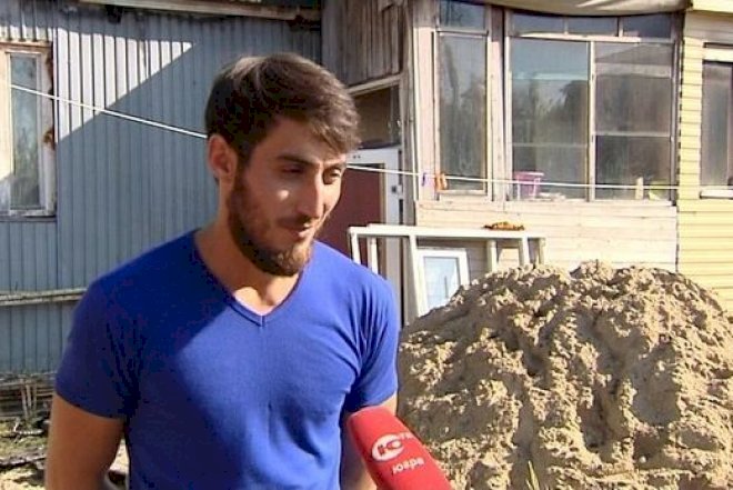    Azərbaycanlı gənc Rusiyada yanan evə girib insanları xilas etdi - Video   