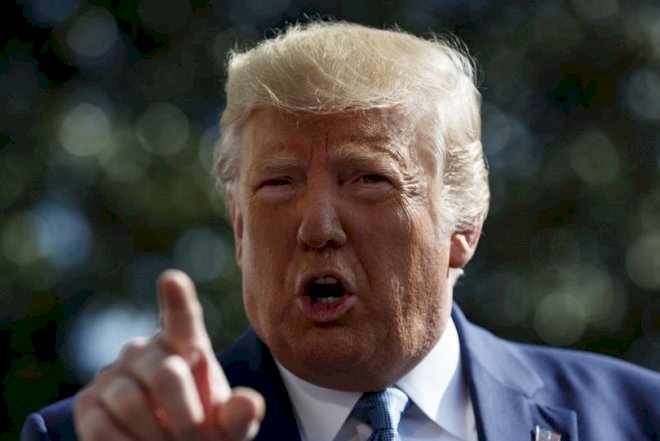    Amerika miqrantlar üçün xəyala çevrilir - Tramp qalmaqallı qanunu imzaladı   