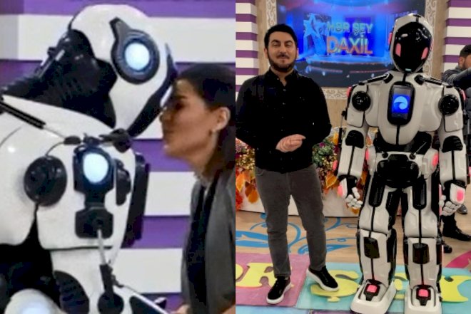    Tolik efirə robot çıxardı, müğənniyə aşiq olub onunla öpüşdü - Video   