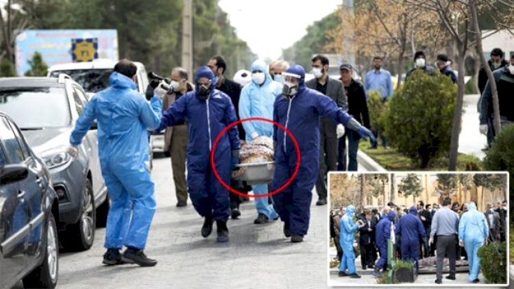    Koronavirusdan ölən millət vəkilinin meyitini xüsusi geyimlilər daşıdı - Foto   
