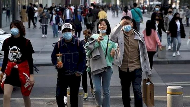    Çində insanlar küçələrə axışdı - Foto   
