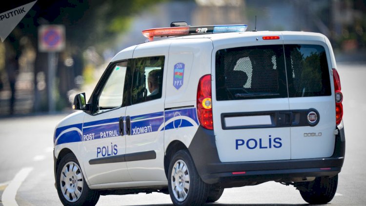    Polis maşınının şüşəsini sındırdı   - Cavab verəcək