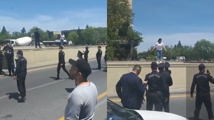    Bakıda qadın intihar etmək istəyir -   Video + Yenilənib