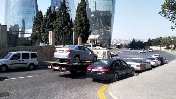    Erkin Qədirlinin avtomobilini evakuator apardı - Fotolar   