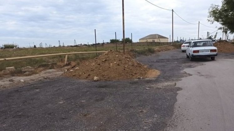    “Akkord”un maşınları qəsəbənin yolunu dağıdıb - Fotolar   