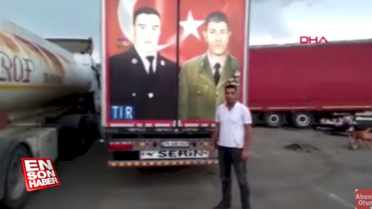    Gürcü polisi Mübariz İbrahimovun fotosunu sökmək istədi, türk sürücü icazə vermədi - Video   