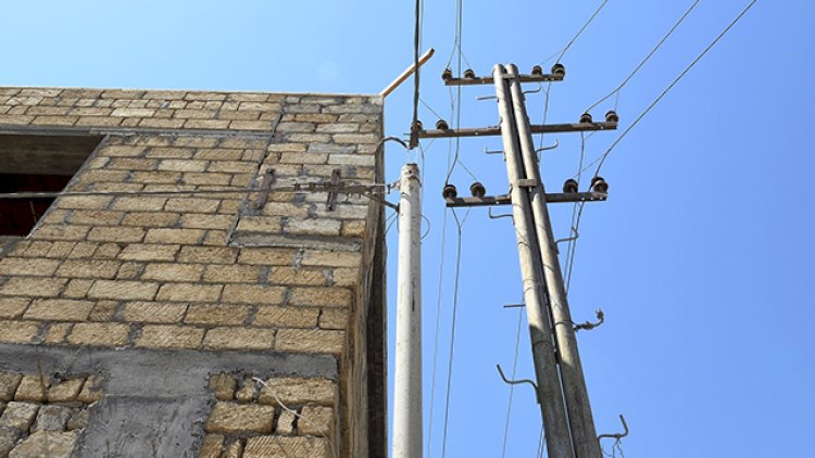    Elektrik xəttinə toxunan ikimərtəbəli obyektlə bağlı açıqlama - Fotolar   
