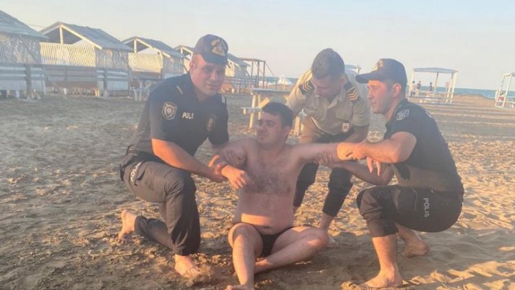    Polislər boğulmaq üzrə olan 2 nəfərin həyatını xilas etdi - Fotolar   