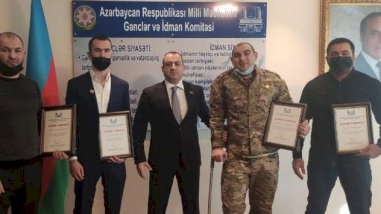    Milli Məclisdə Vətən müharibəsinin qazisi və idmançılarla görüş keçirildi - Foto   