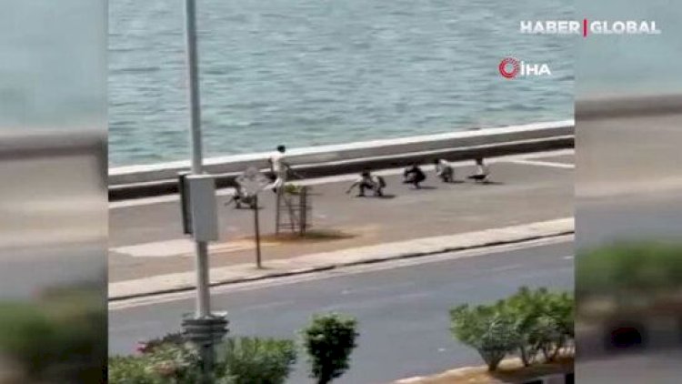    Polisdən maska taxmayanlara “ördək yerişi” cəzası - Video   