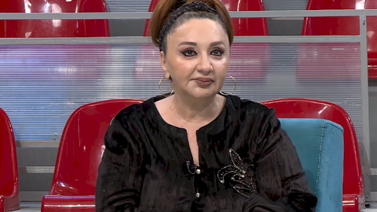    Şok iddia: Əri Xalq artistini döyüb   - Video