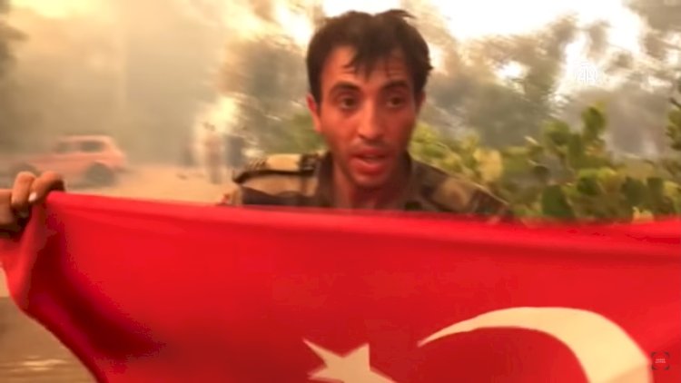     Azərbaycanlı yanğınsöndürən Türk bayrağını yanan evdən çıxardı    