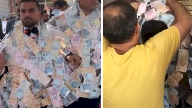    Toyda o qədər pul yığıldı ki, 4 nəfər güclə daşıdı - VİDEO   
