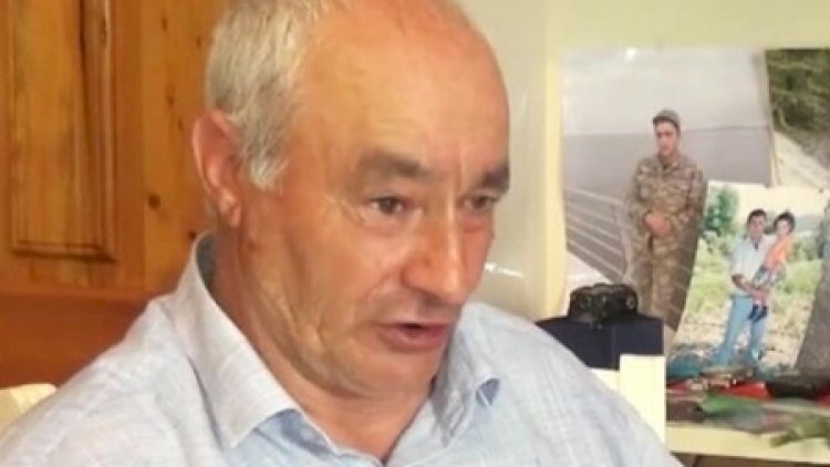    Şəhid atası qudasını bu səbəbə görə öldürübmüş: Oğlunun plakatını...   