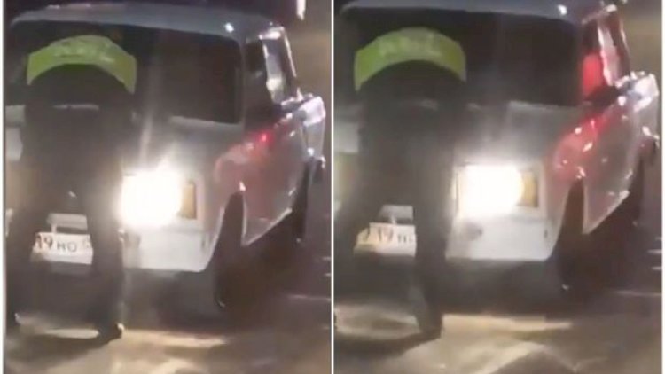    Sürücü yol polisini avtomobilinin kapotunun üstündə “gəzdirdi” - Video   