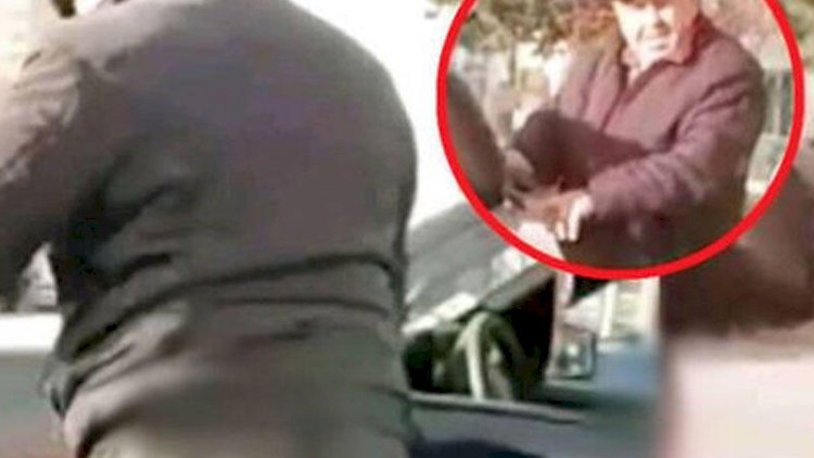    Maşınını bayraqla silən 72 yaşlı sürücü üzr istədi   - Video