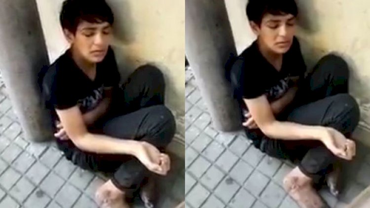    Yeniyetmə oğlan narkoloji dispanserdən buraxıldıqdan sonra küçədə dilənçilik edir - Video   