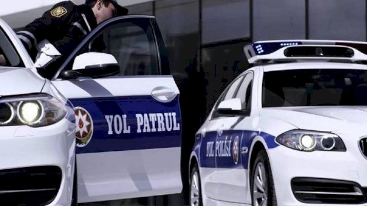    Polis avtomobilinin üzərinə benzin töküb yandırmaqla hədələdi   