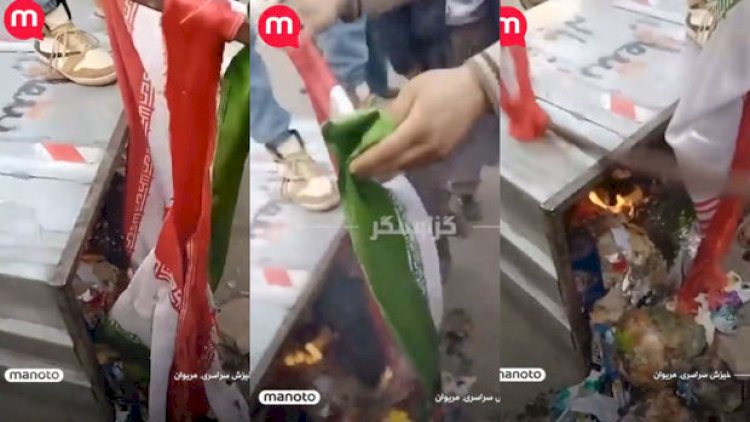    Etirazçılar İran bayrağını zibil qutusuna atıb yandırdılar    
