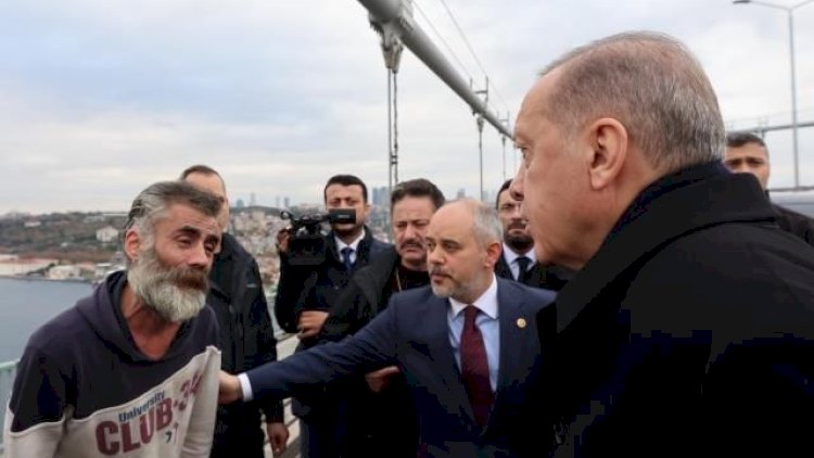    Ərdoğan özünü körpüdən atmaq istəyən şəxsi xilas etdi - Video   