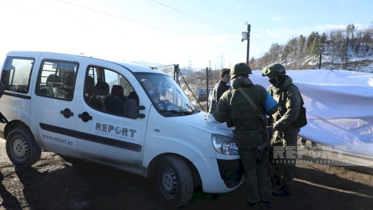    Rus hərbçisi “Report”un avtomobilinə avtomat silahla zərər yetirdi   