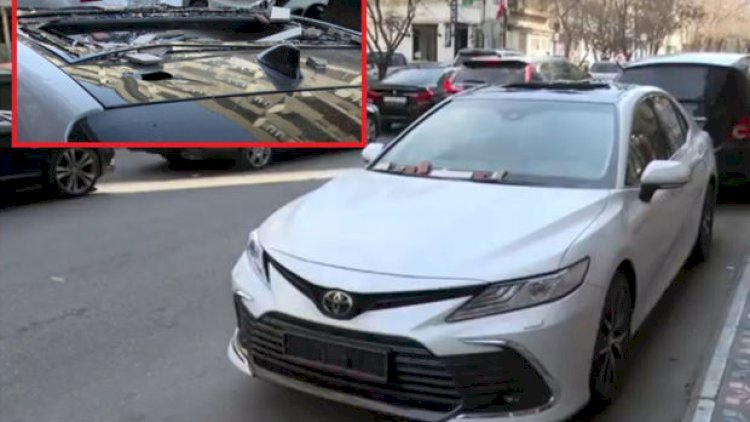    Bakıda binanın fasadından qopan daşlar avtomobilə ciddi ziyan vurdu - Video   