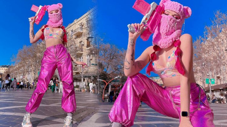    “Torqovı“da poz verən blogerə polisdən xəbərdarlıq:  “Ana-bacı baxır”   