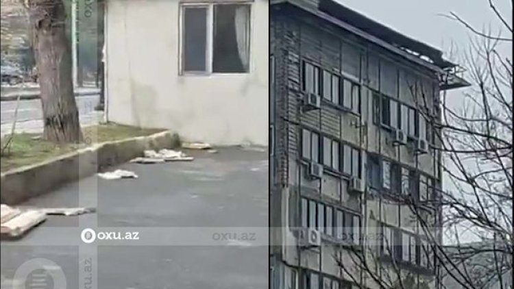    Bakıda təhlükə: Külək binanın üzünü qopardı - Video   