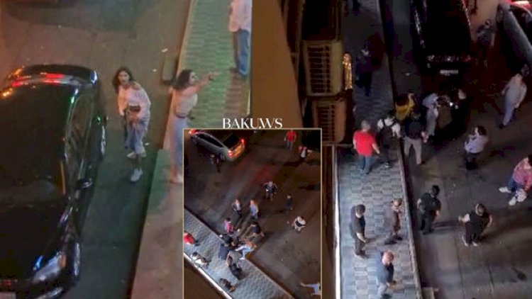    Bakıda qız gecə vaxtı dəyənəklə polisə hücum etdi - ANBAAN VİDEO   