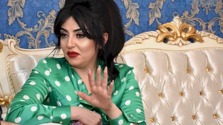    Afət həmkarlarını yıxıb-sürüdü: “Bic doğub uşaqlarınızı bədbəxt etməyin!”   - Video