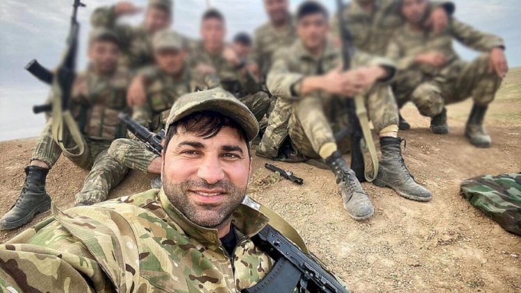    Kamil bu fotoya görə saxlanılıb?    
