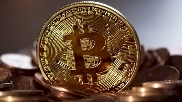    Bitkoindən tarixi rekord: Qiyməti 70 mini ötdü   