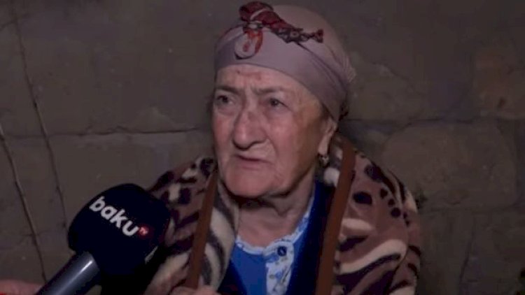    85 yaşlı qadın oğlu tərəfindən döyülərək küçəyə atıldı - Video   