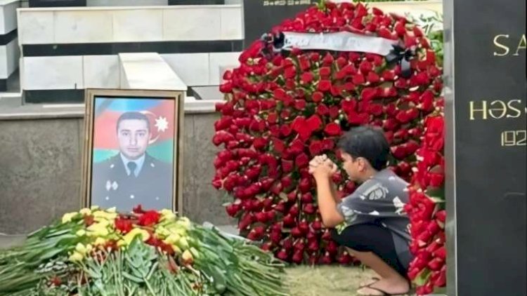    Bakıda öldürülən polisin məzarı - FOTO    