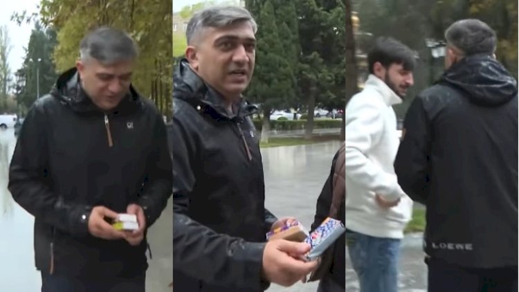    Müğənni küçədə salfet satdı  -   VİDEO