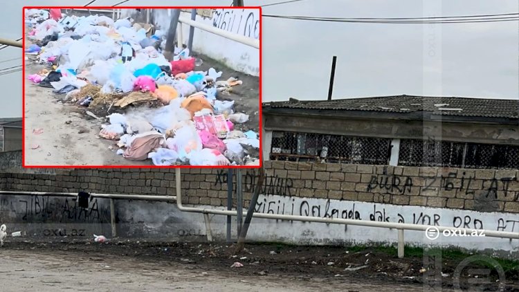    Hökməlidə məktəbin qarşısında zibillik yarandı, polis işə qarışdı   
