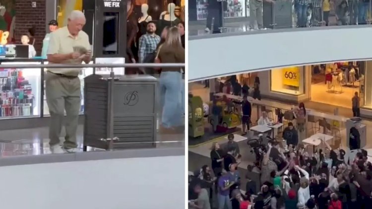    Qoca kişi “Mall”da insanların başına pul səpələdi   