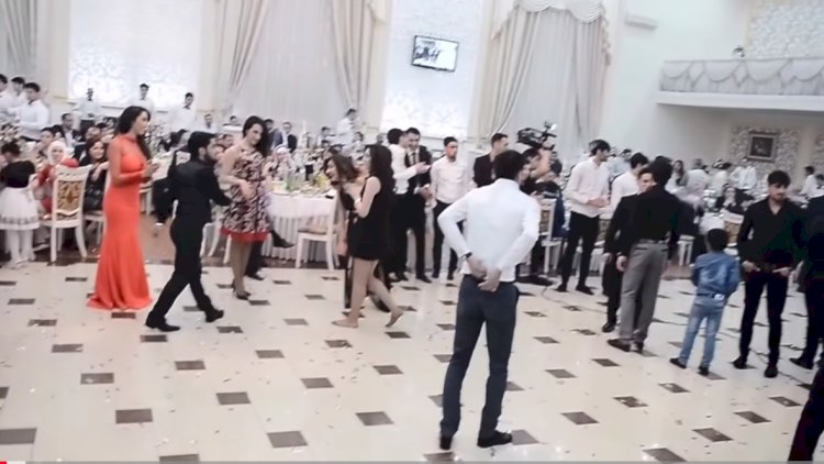    Bakıda kişi arvadının geyiminə görə toyda   dava saldı
