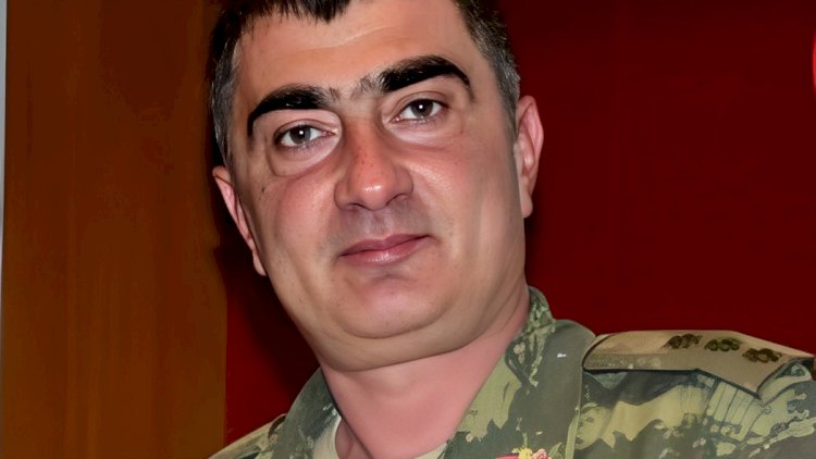    Maşınına od vuran hərbçi   DANIŞDI
