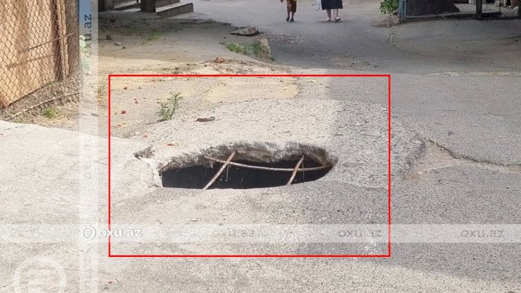    Yaşayış məntəqəsində təhlükəli vəziyyət: Yolun ortasında dərin çuxur var   