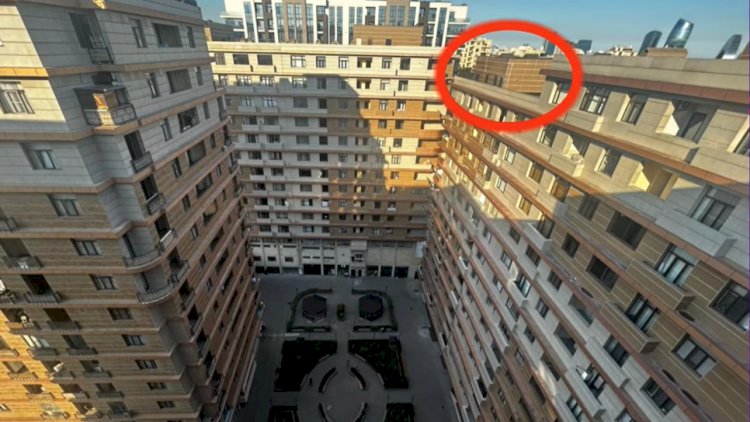    Bakıda ŞOK! 15 mərtəbəli binanın damında mənzil tikib, satışa çıxardılar   