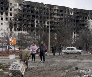    Ukraynada qandonduran MƏNZƏRƏ: Cəsədlərlə dolu anbar tapıldı   - Fotolar